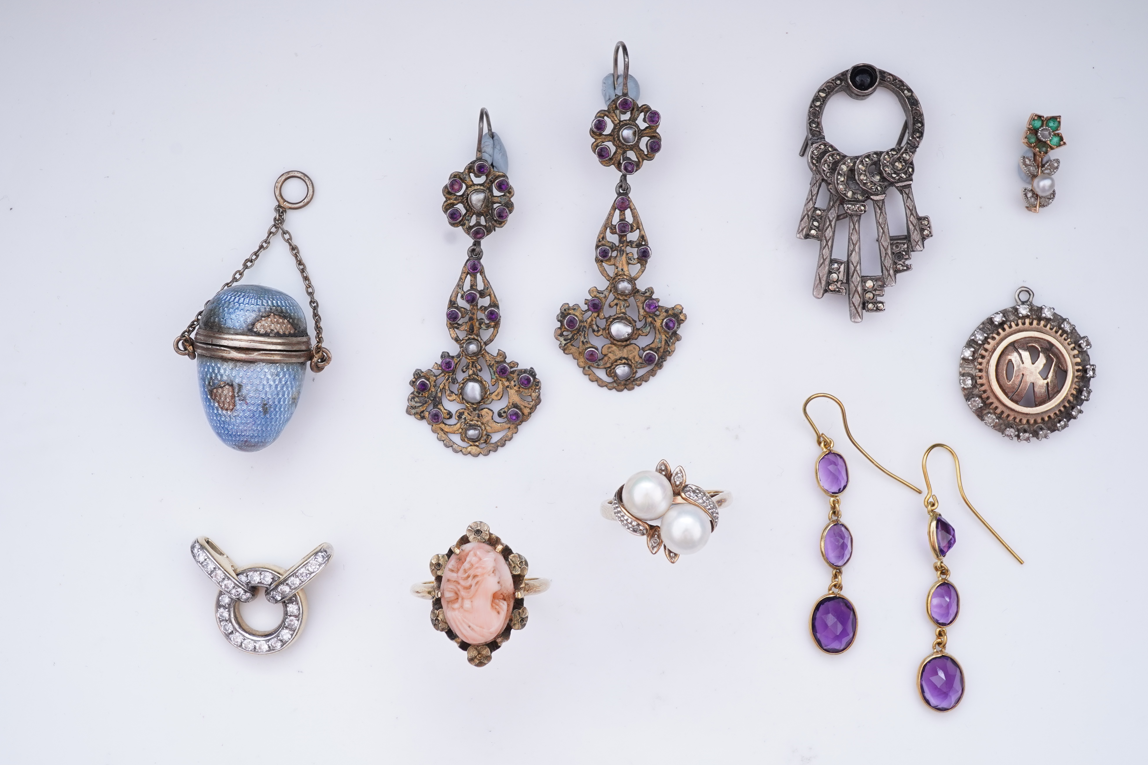 A rare set of amethyst and seed pearl buttons, circa 1900